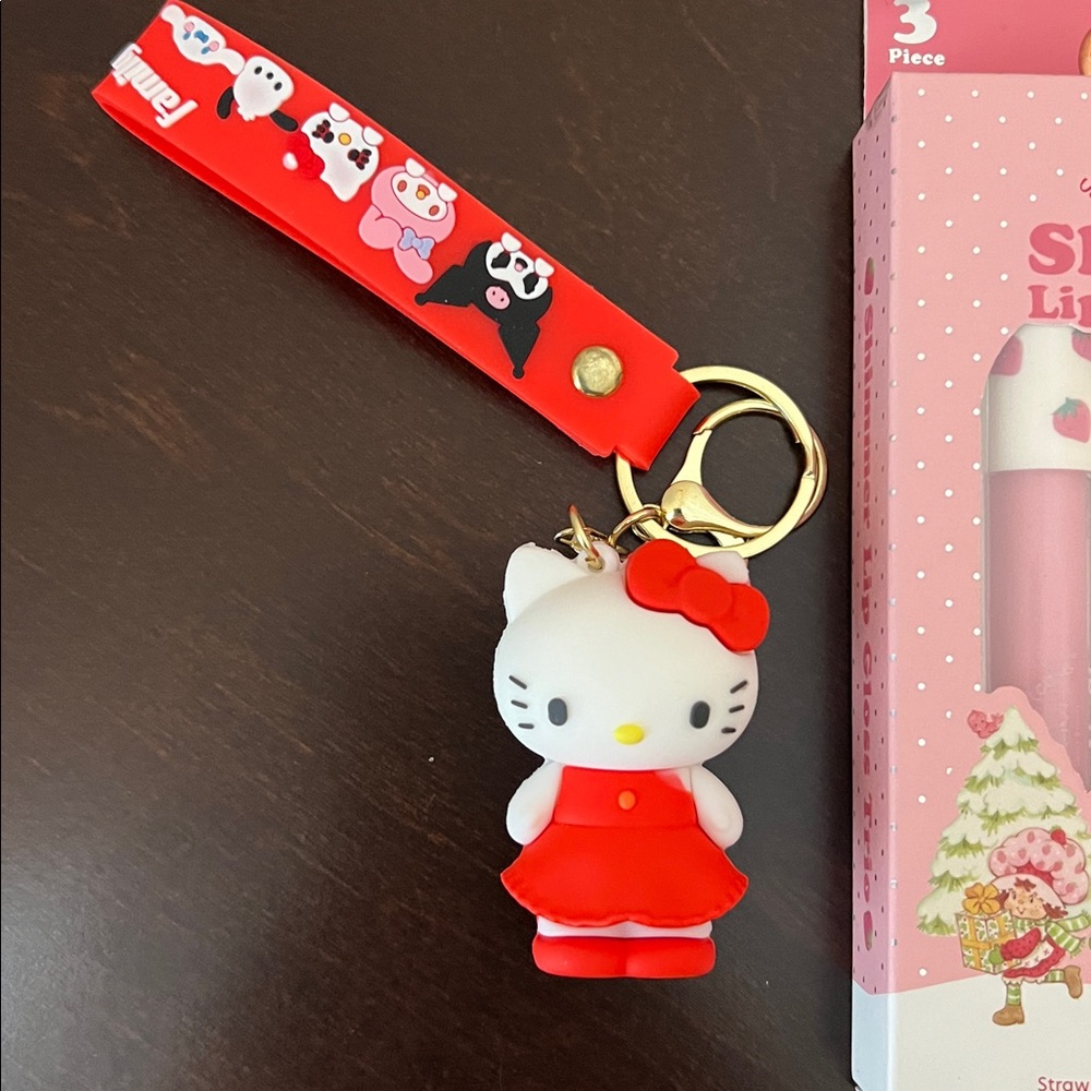 Hello Kitty Keychain and Shimmer Lip Gloss Trio - Picture 2 of 3